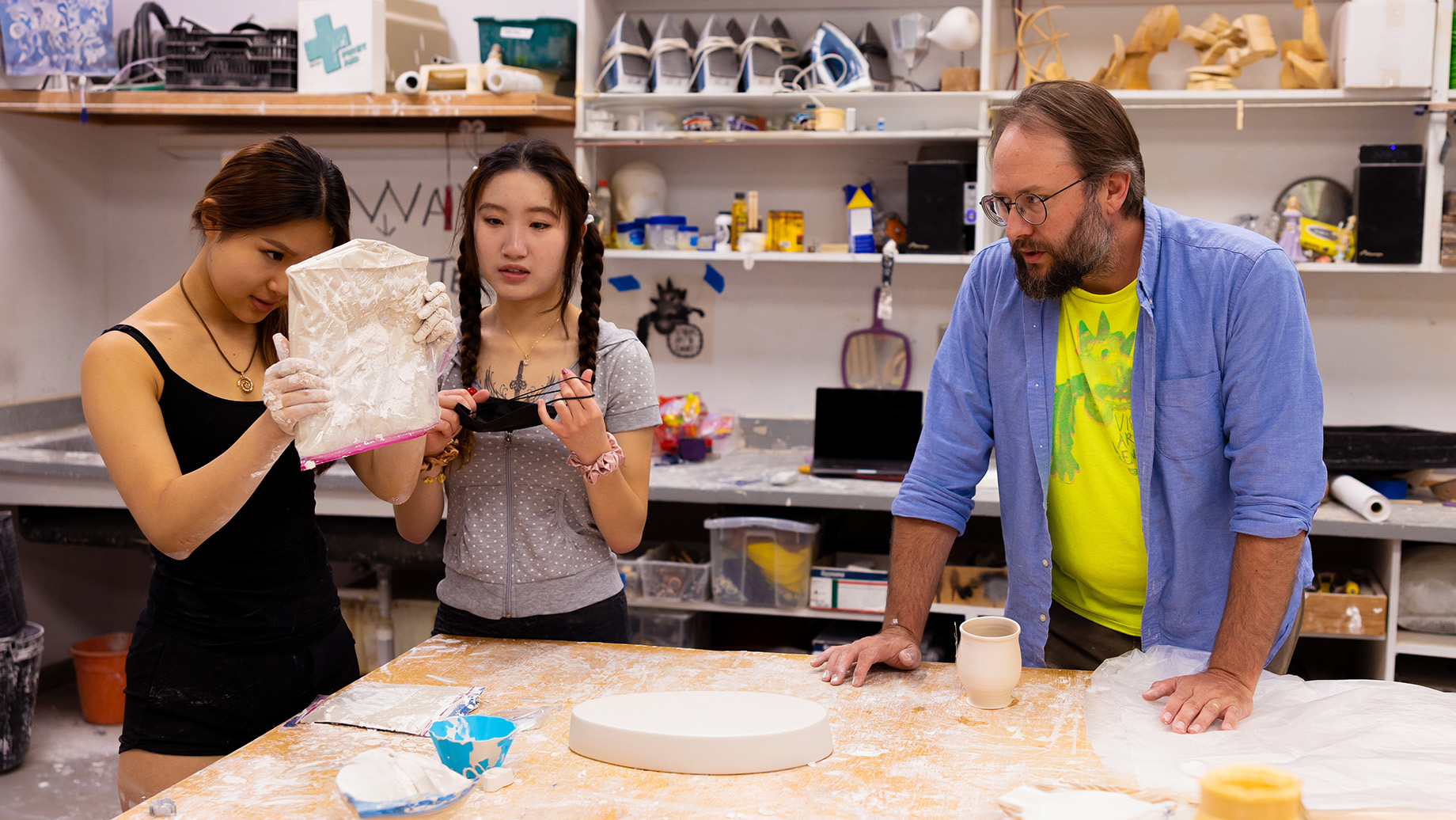 students and teacher in classroom