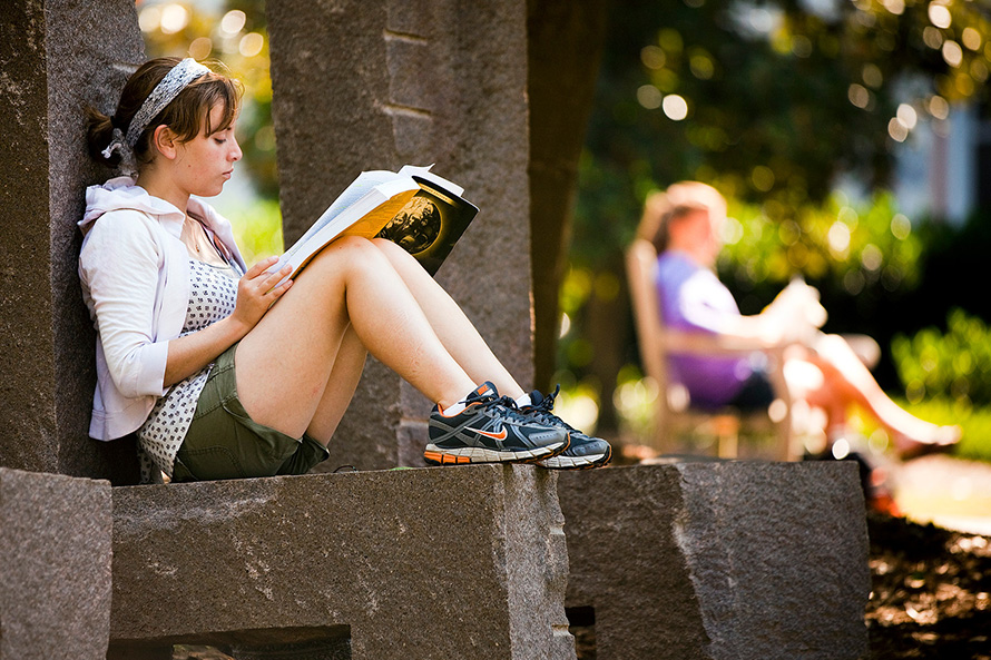 student reading a book