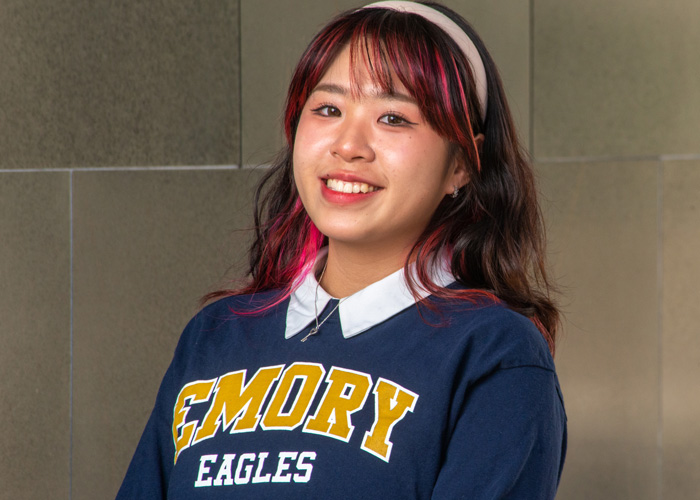 Student with Emory sweatshirt