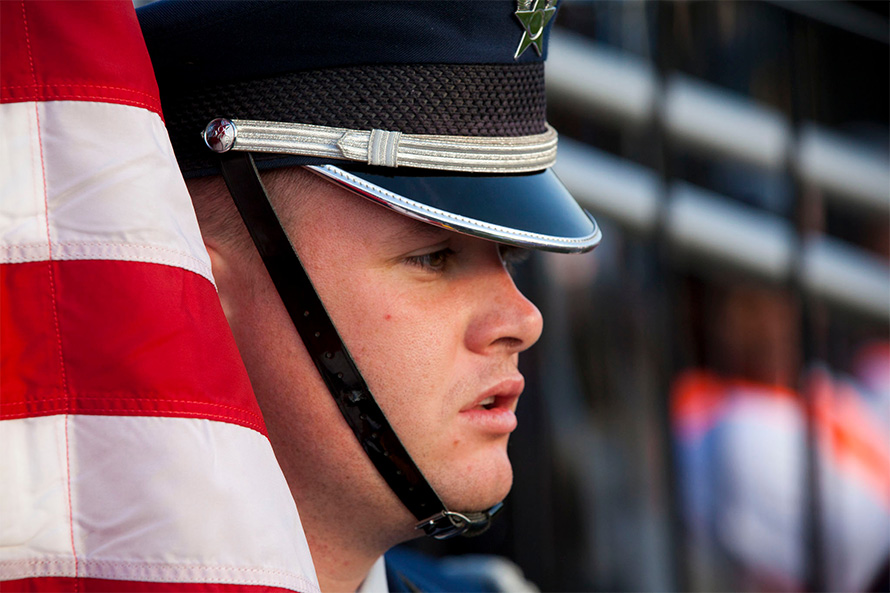 ROTC student with flag