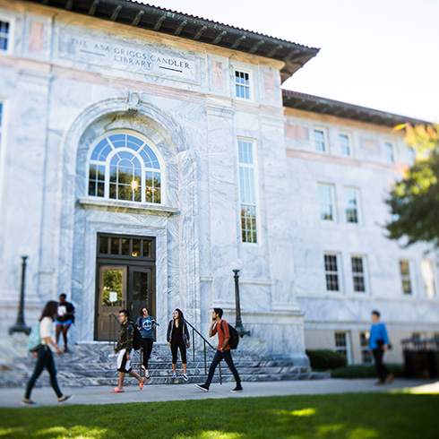 students walk past building on ATL campus