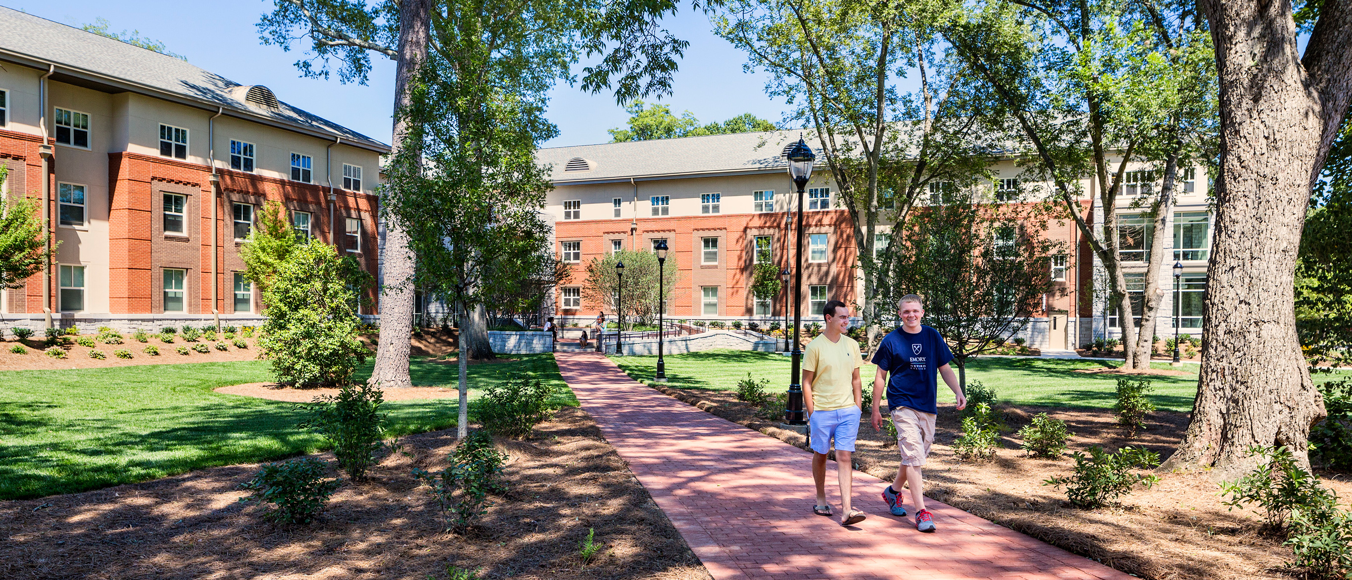 Two men walk on Oxford's campus