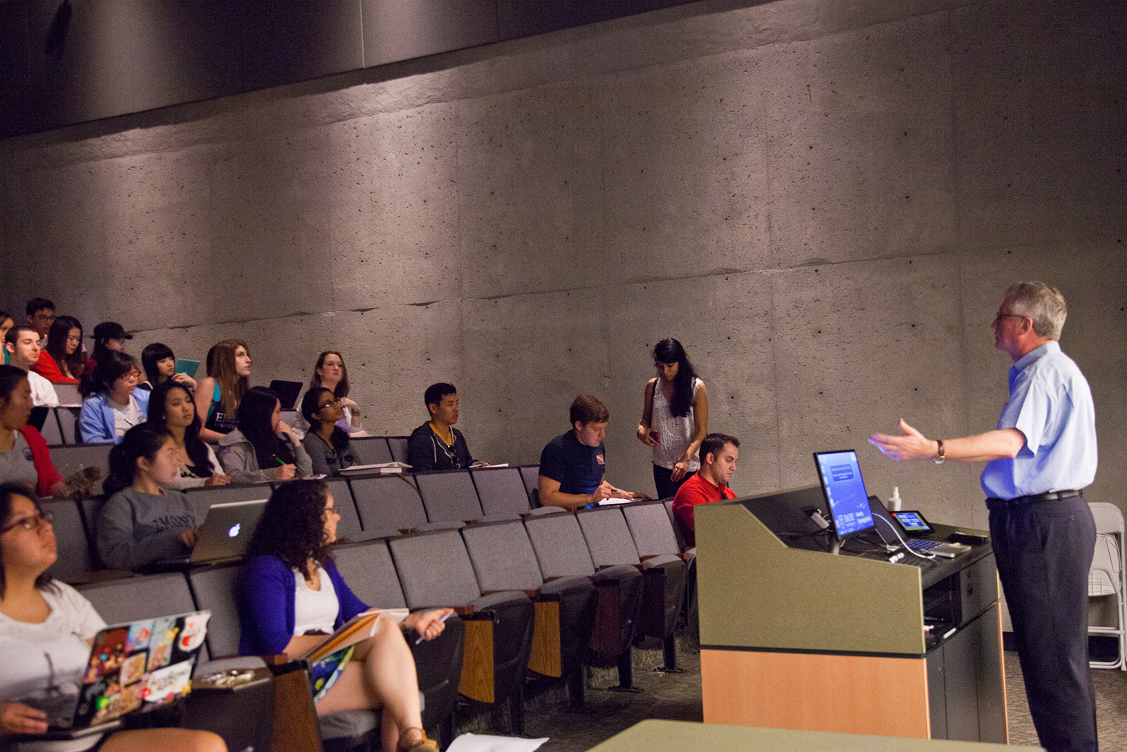 teacher and students in auditorium